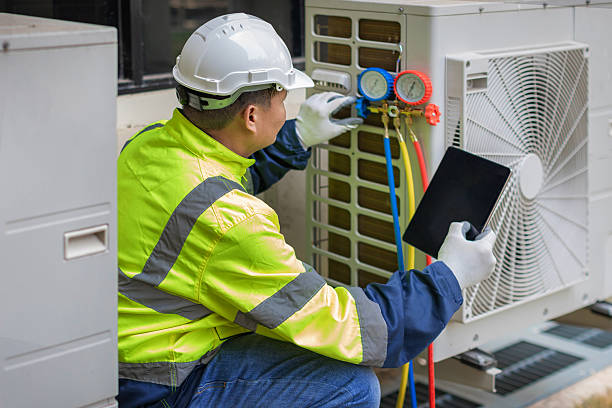 Professional Heat Pump Repair technician working in Solon, IA